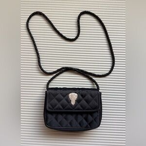 Chic Jay Herbert New York quilted satin mini crossbody bag.